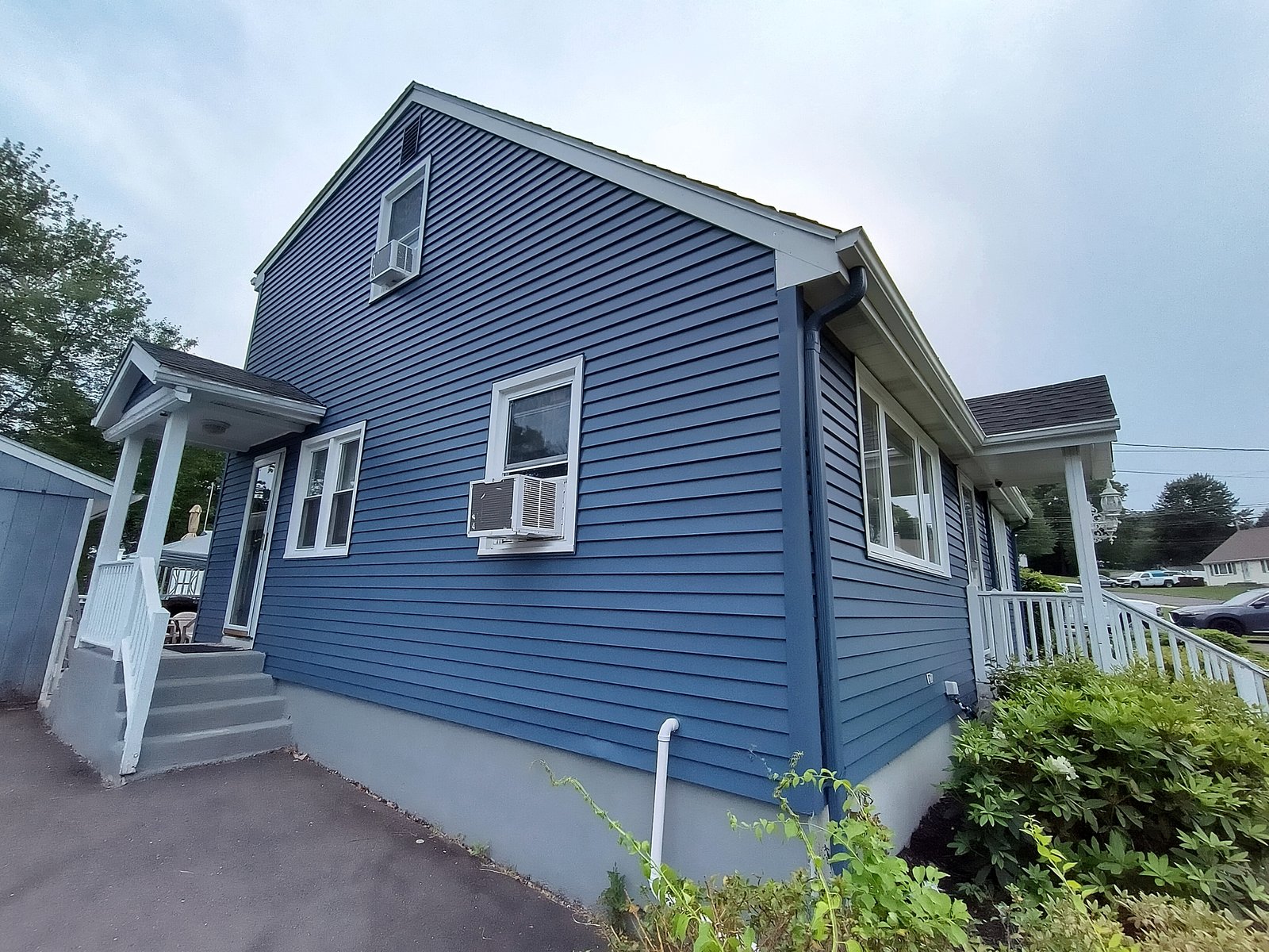 Exterior House Blue Siding White Trim 4 — Frank Leonard Painting LLC
