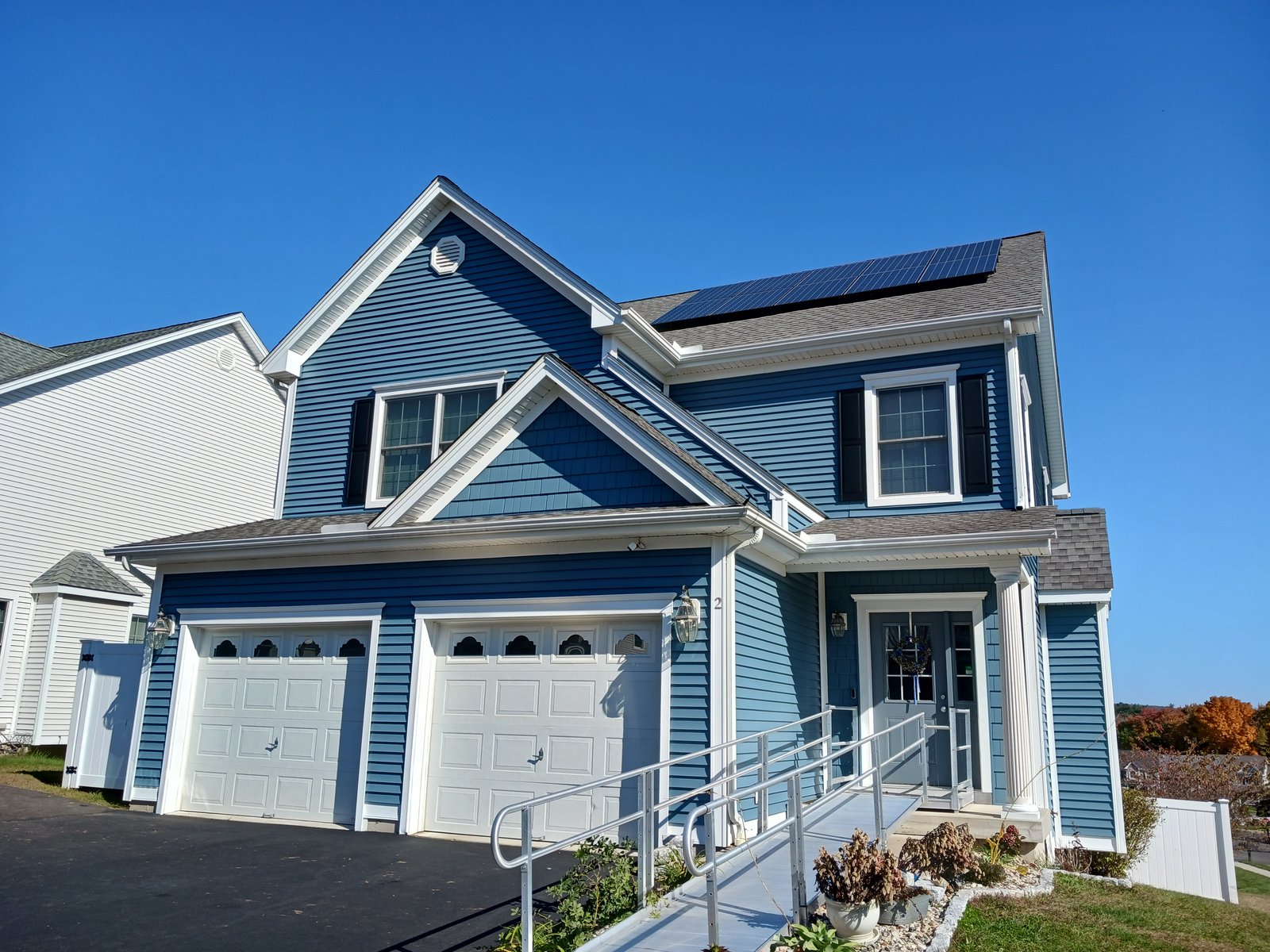 Exterior House Blue Siding White Trim Black Shutters — Frank Leonard Painting LLC