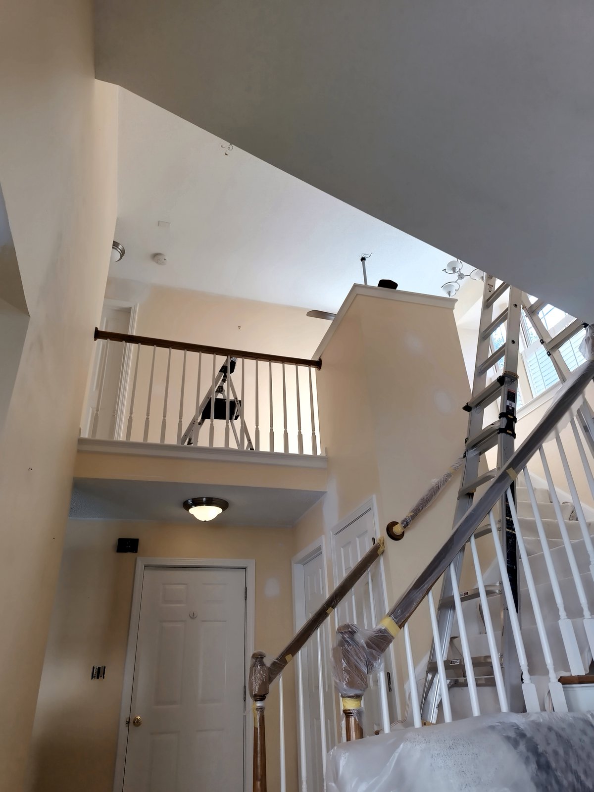 Interior Foyer Staircase Painting In Progress — Frank Leonard Painting LLC