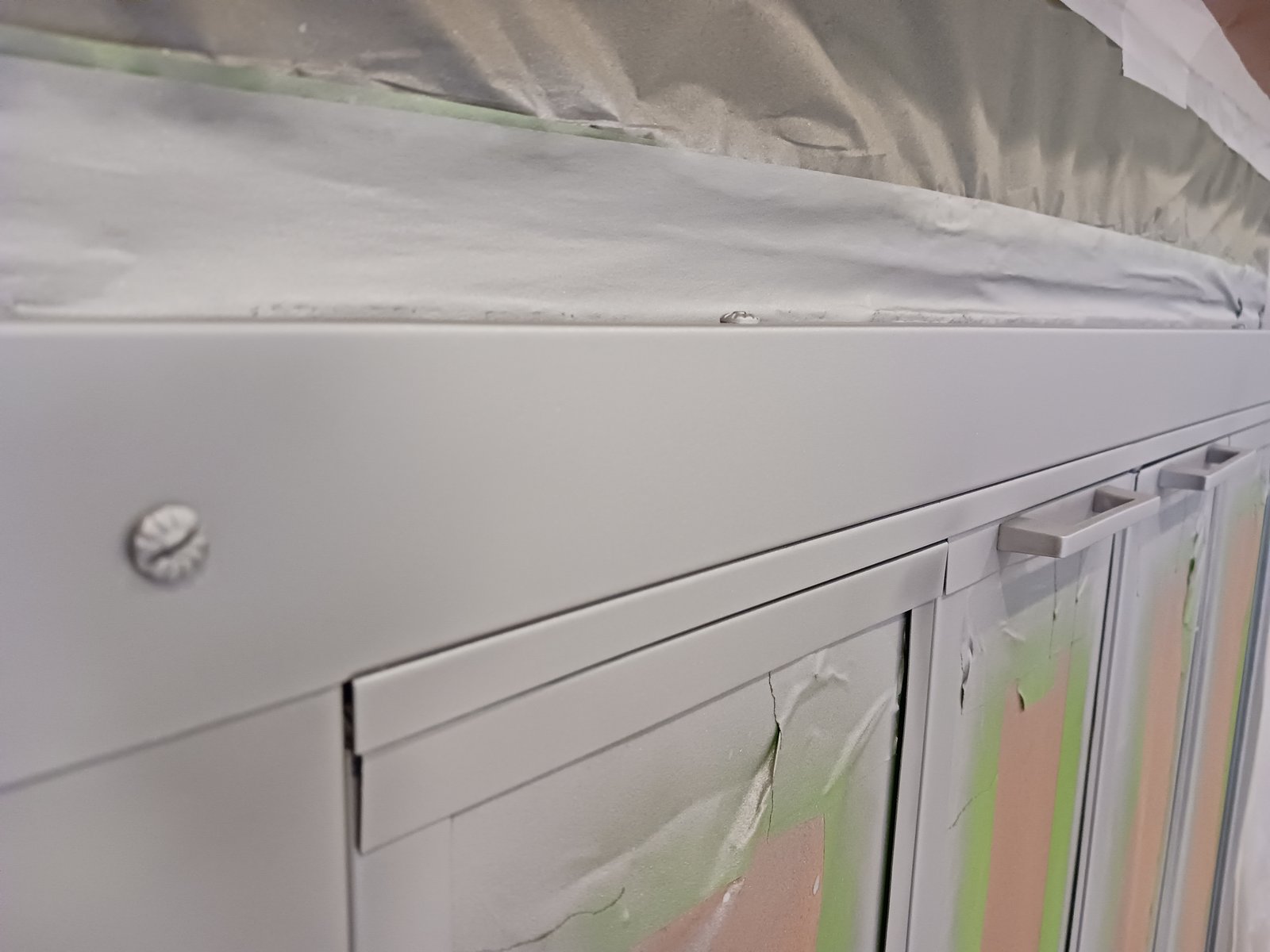 Kitchen cabinets — light gray refinish